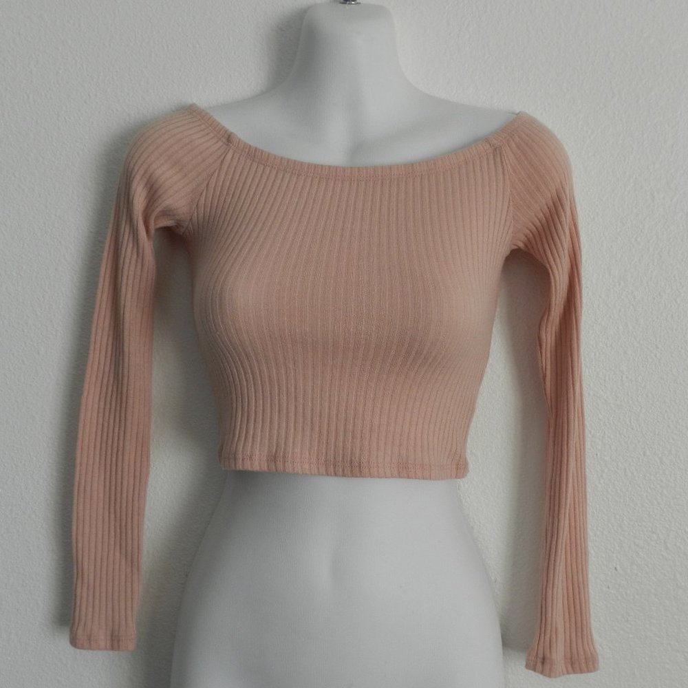 The Classic boat neck, long sleeve, ribbed crop top in pale peach
